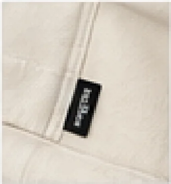 DOCUMENT TOTE — neck label close-up